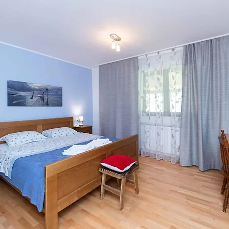 Apartment In 45268 Grižane